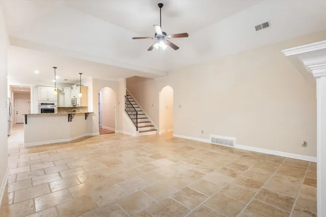 a view of a kitchen with furniture and a kitchen view