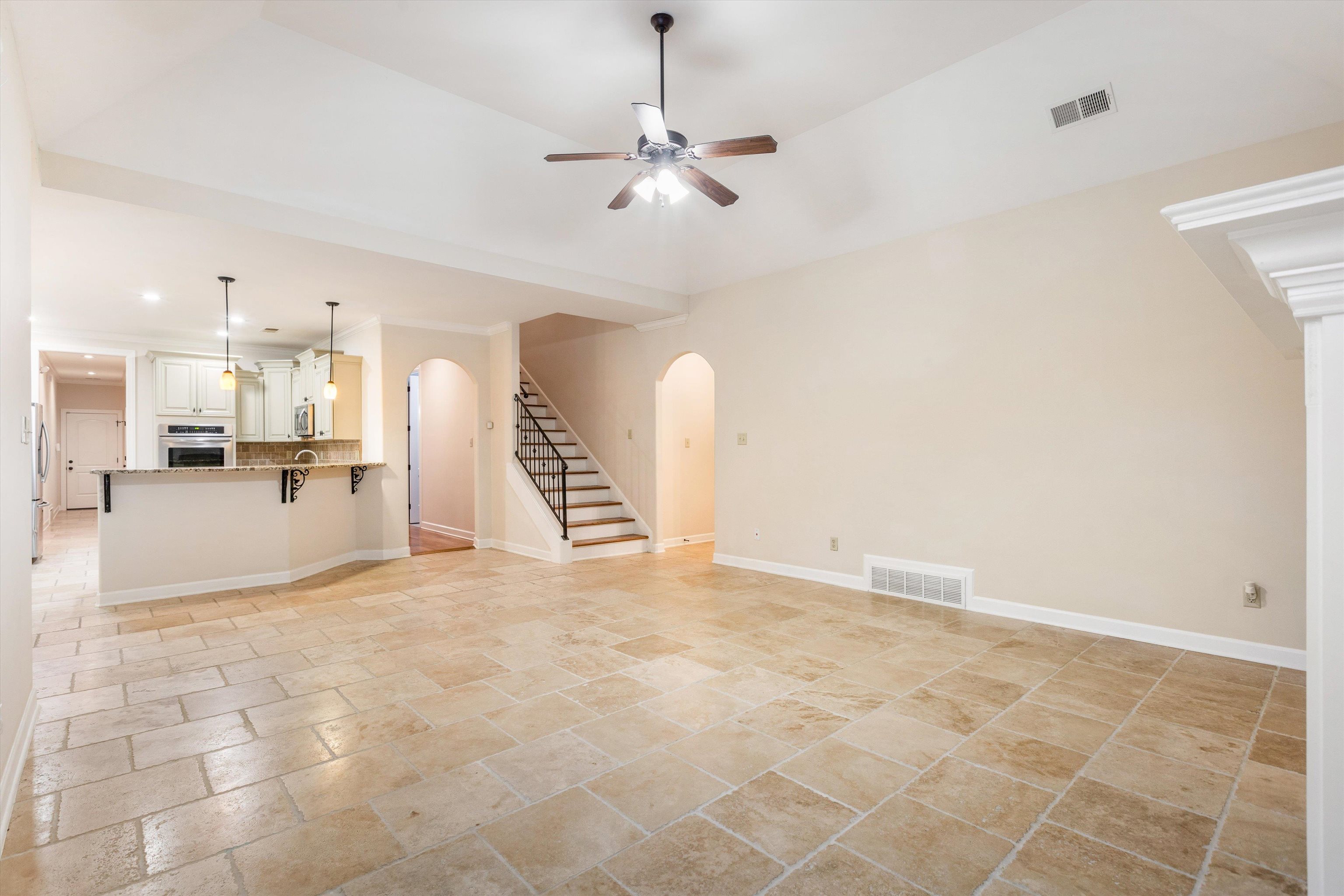 1651 Dehaig Lane Collierville, TN 38017 - Photo 9 of 36 a view of a kitchen with furniture and a kitchen view