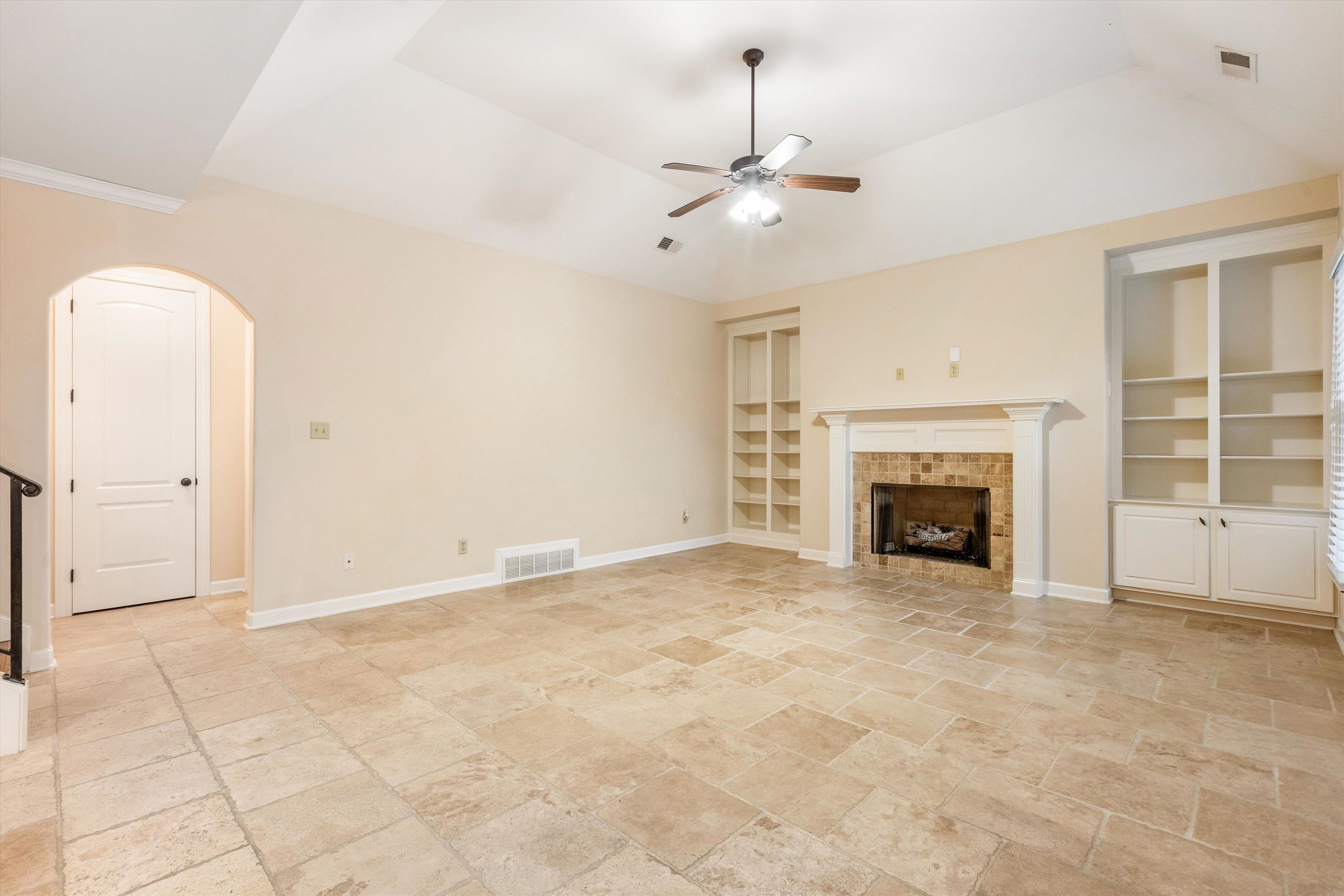 1651 Dehaig Lane Collierville, TN 38017 - Photo 10 of 36 a view of an empty room with a fireplace