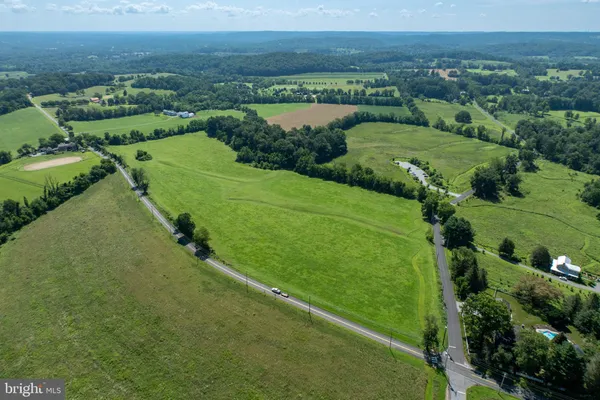 an aerial view of a golf course with a yard
