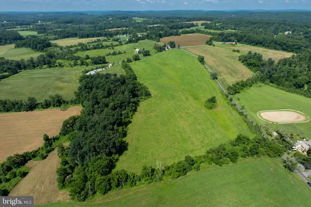 a view of a lake with a yard
