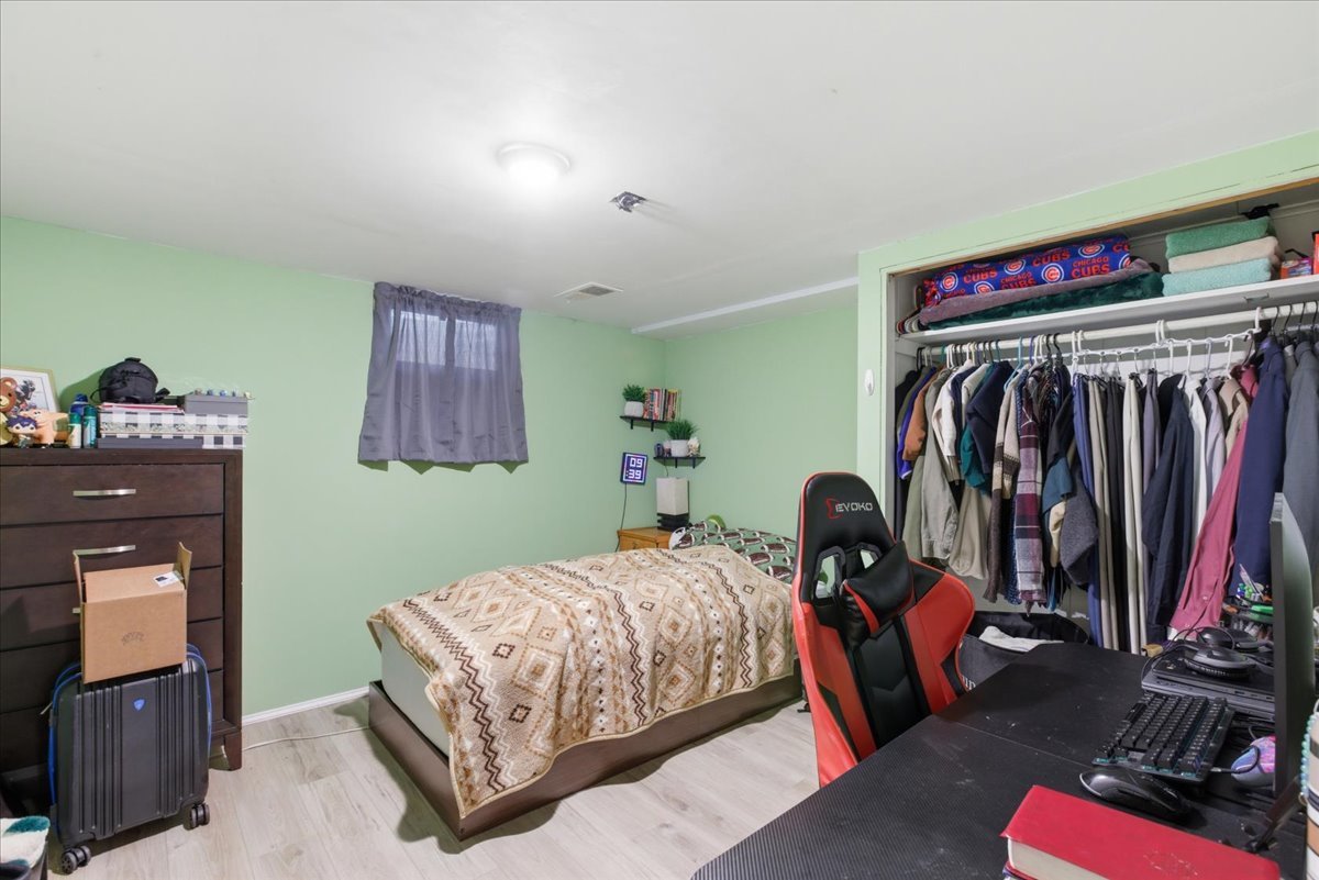 270 Ridge Avenue Crystal Lake, IL 60014 - Photo 11 of 19 a bedroom with a bed and a closet