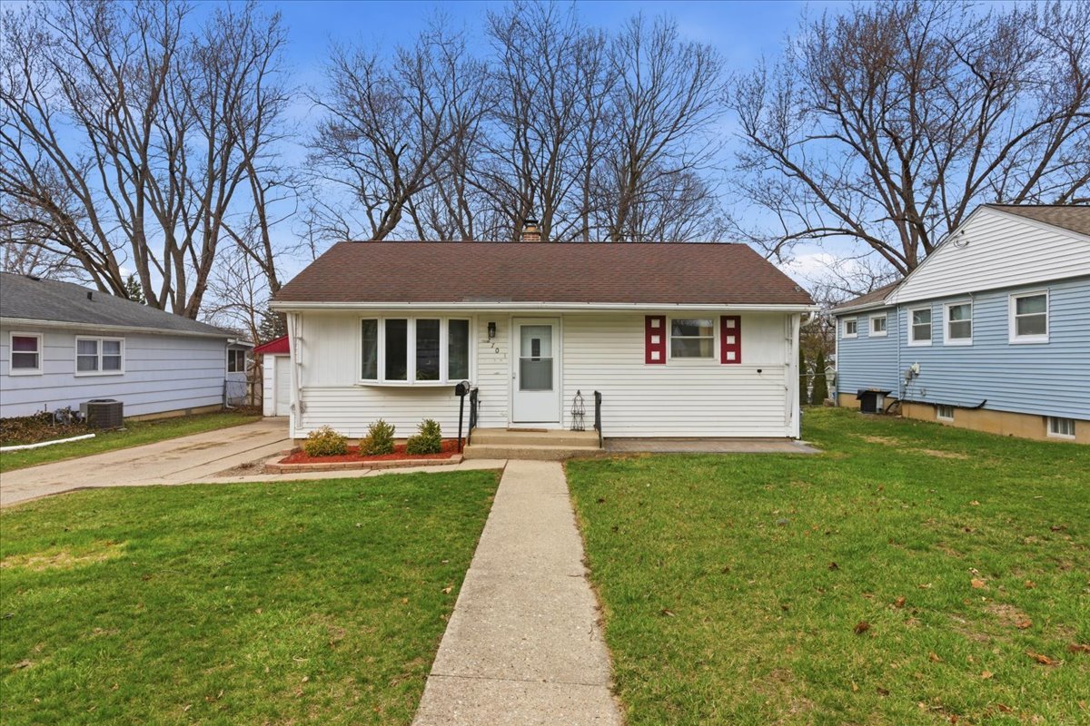 270 Ridge Avenue Crystal Lake, IL 60014 - Photo 18 of 19 a front view of a house with a yard and trees