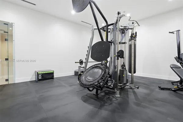 a view of room with gym equipment