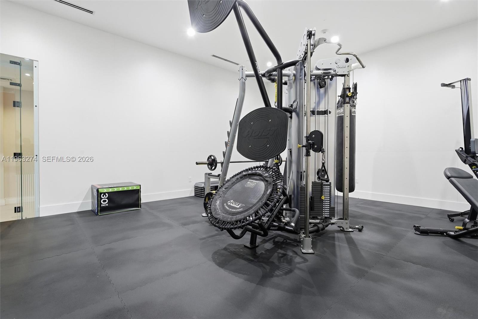 801 Brickell Key Boulevard, Unit 3209 Miami, FL 33131 - Photo 19 of 24 a view of room with gym equipment