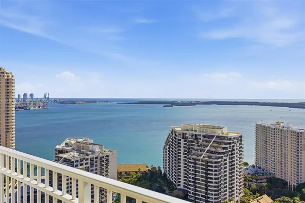 a view of a balcony with an ocean view