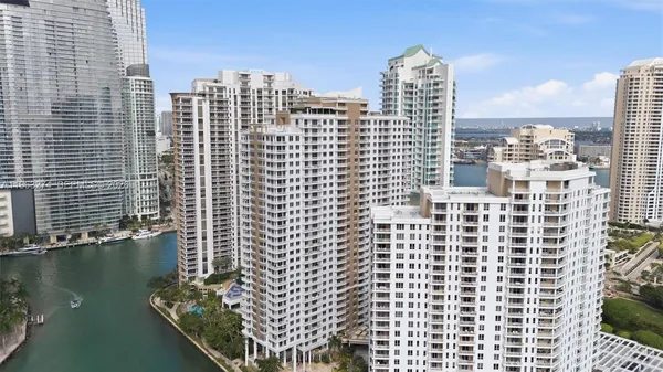 a view of a city with tall buildings