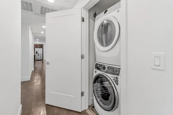 a view of a hallway with closet