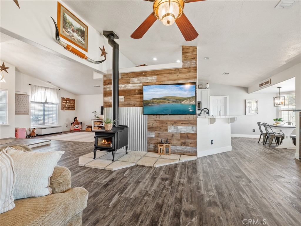 6370 Fremontia Road Hesperia, CA 92344 - Photo 21 of 62 a living room with furniture and wooden floor
