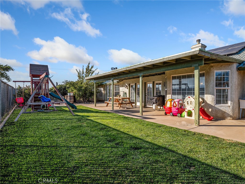 6370 Fremontia Road Hesperia, CA 92344 - Photo 42 of 62 a view of a house with backyard