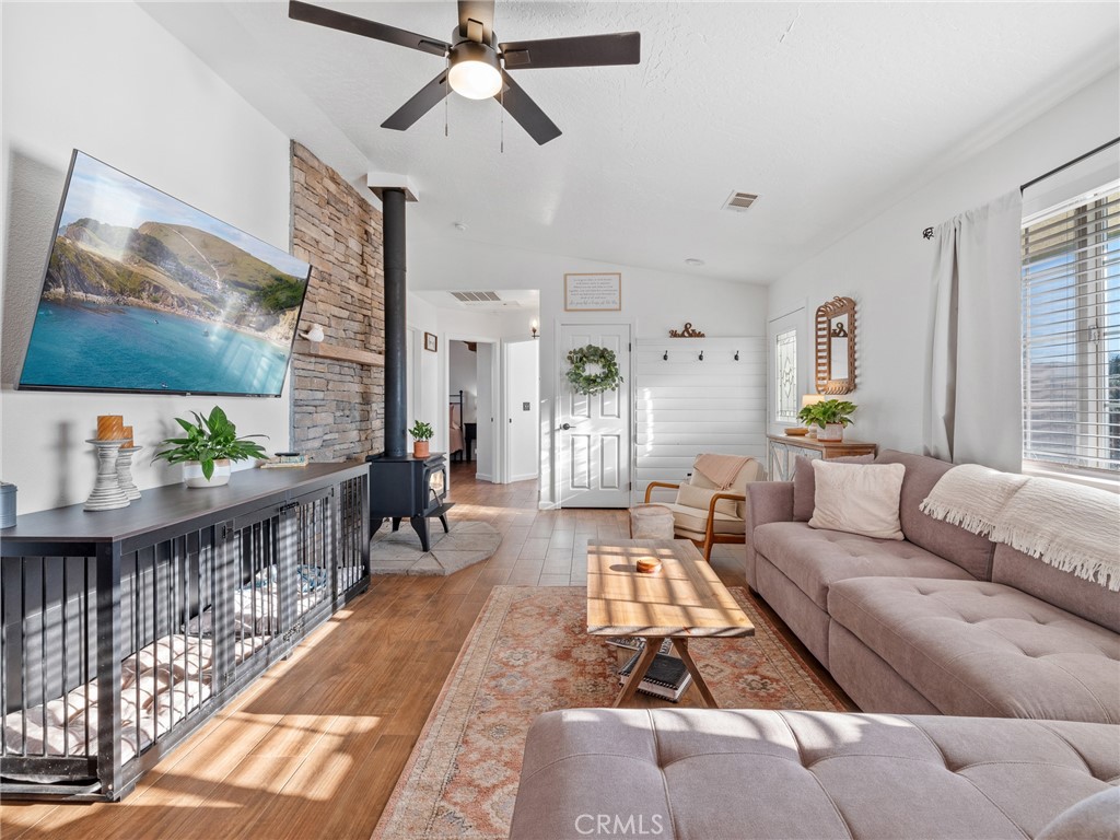 6370 Fremontia Road Hesperia, CA 92344 - Photo 51 of 62 a living room with furniture and a rug