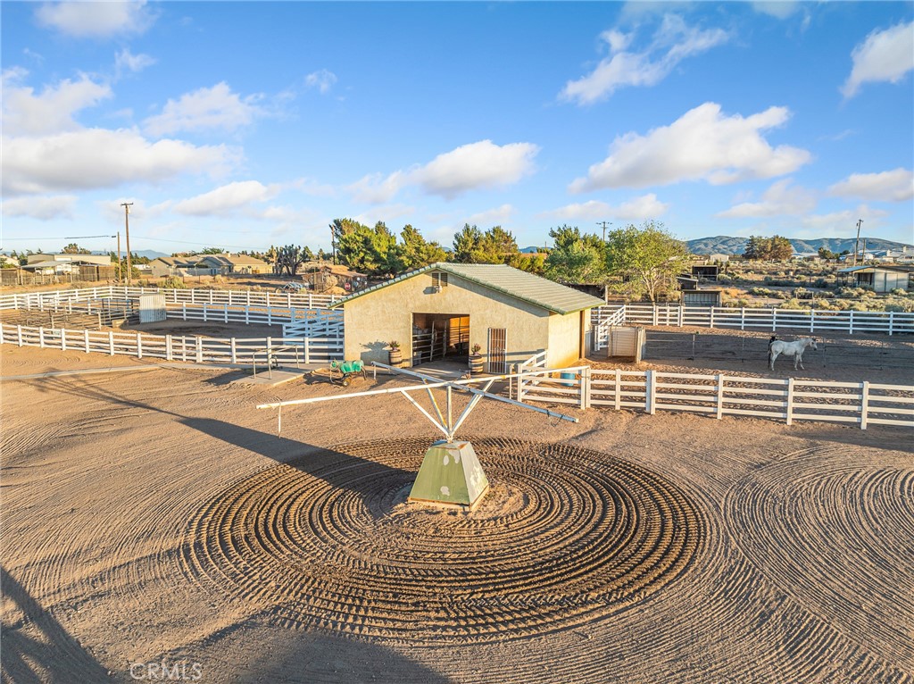 6370 Fremontia Road Hesperia, CA 92344 - Photo 9 of 62 a front view of a house with swimming pool