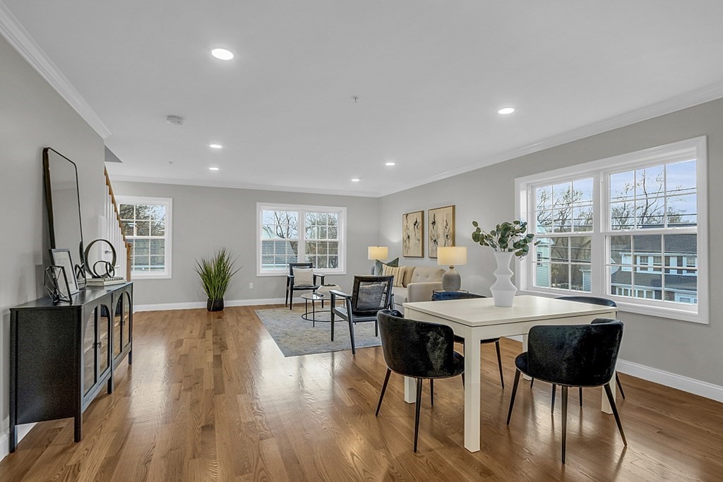 30 Broadway, Unit A Lynn, MA 01904 - Photo 15 of 34 a view of a dining room with furniture window and wooden floor