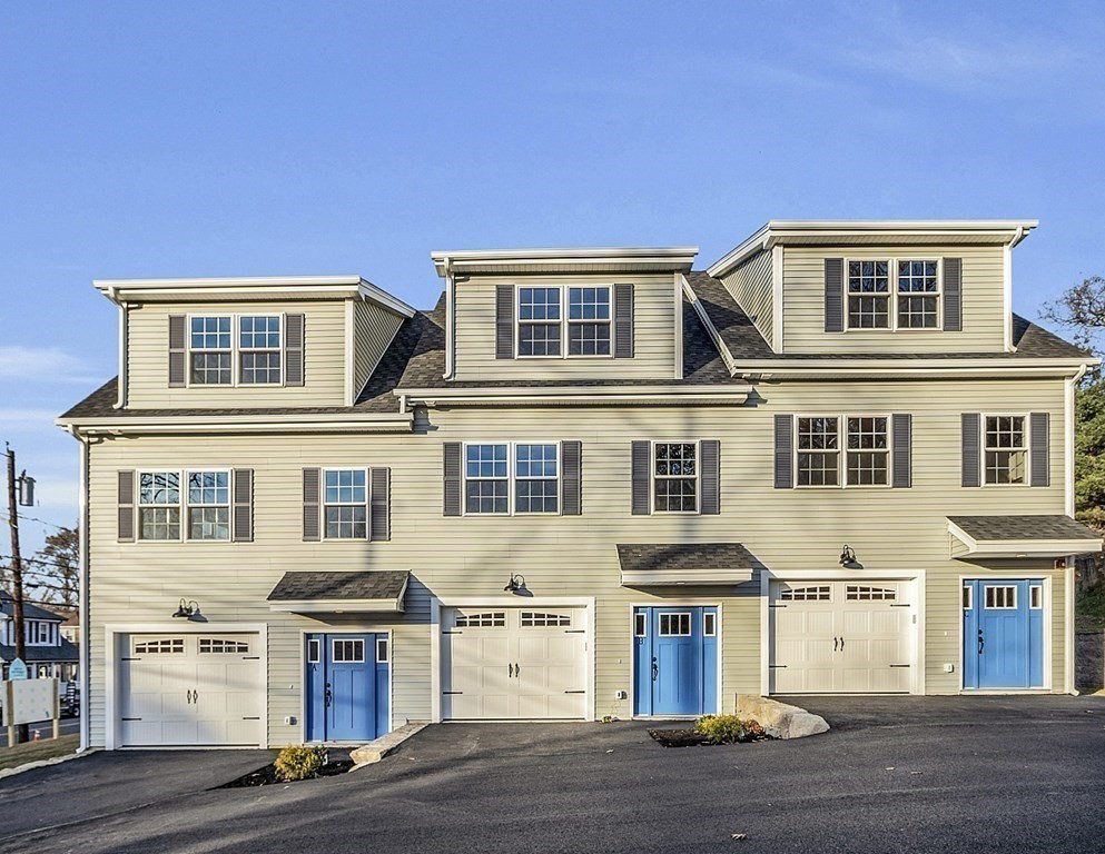 30 Broadway, Unit A Lynn, MA 01904 - Photo 3 of 34 a front view of residential houses
