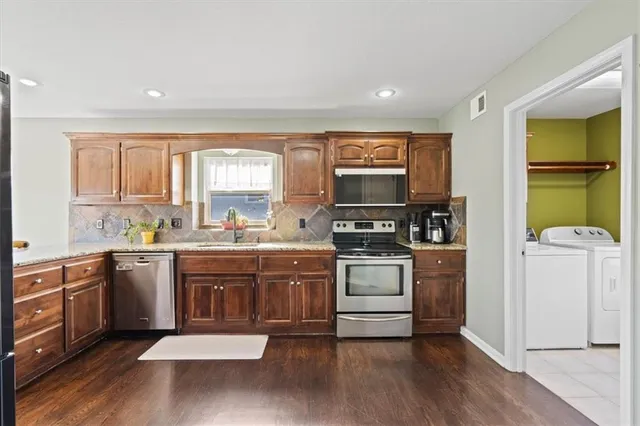 $370,000 | 1001 Southwest Powell Drive, Oak Grove, MO 64075