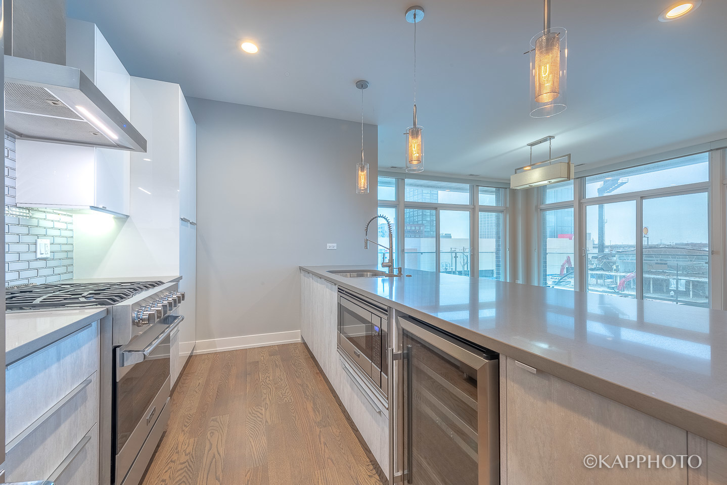 236 South Racine Avenue, Unit 401 Chicago, IL 60607 - Photo 11 of 26 a kitchen with stainless steel appliances granite countertop a stove a sink and a refrigerator