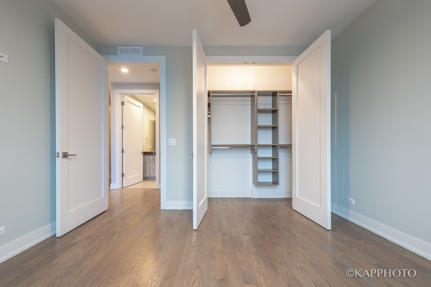 236 South Racine Avenue, Unit 401 Chicago, IL 60607 - Photo 22 of 26 a view of wooden floor and windows in a room