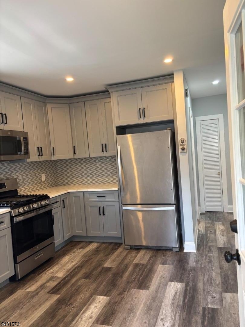 358 Woodland Road, Unit 2 Madison, NJ 07940 - Photo 10 of 50 a kitchen with granite countertop a refrigerator and a sink