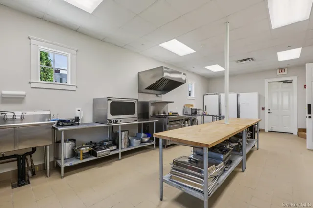 a room with furniture and a flat screen tv