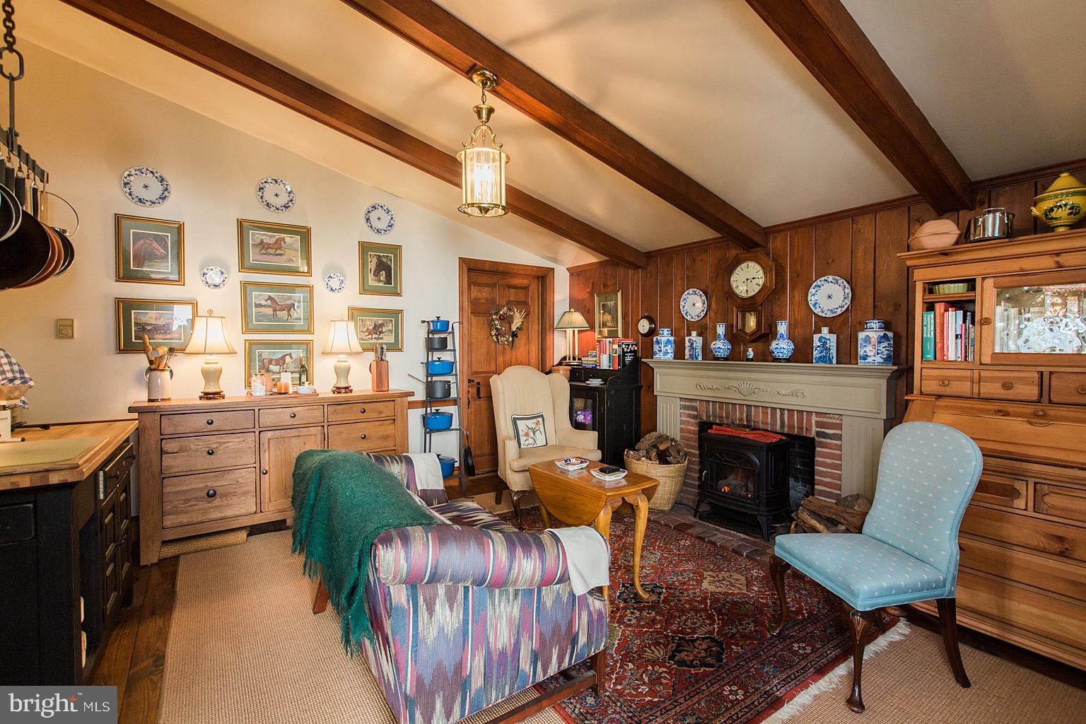 41 Hess Boulevard Lancaster, PA 17601 - Photo 23 of 63 a living room with furniture a fireplace and a large window