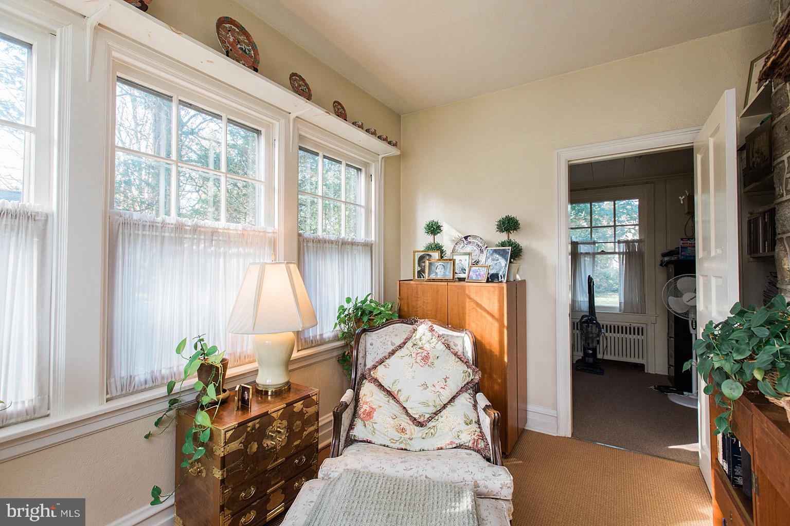 41 Hess Boulevard Lancaster, PA 17601 - Photo 34 of 63 a living room filled with furniture and a potted plant