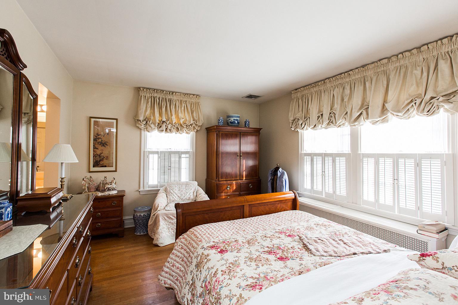 41 Hess Boulevard Lancaster, PA 17601 - Photo 38 of 63 a bedroom with a bed and wooden floor