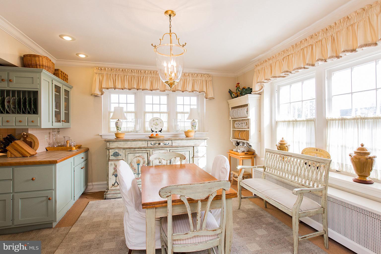 41 Hess Boulevard Lancaster, PA 17601 - Photo 10 of 63 a view of a kitchen with kitchen island granite countertop a table and chairs in it
