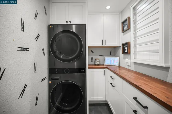 a kitchen with a washer and dryer