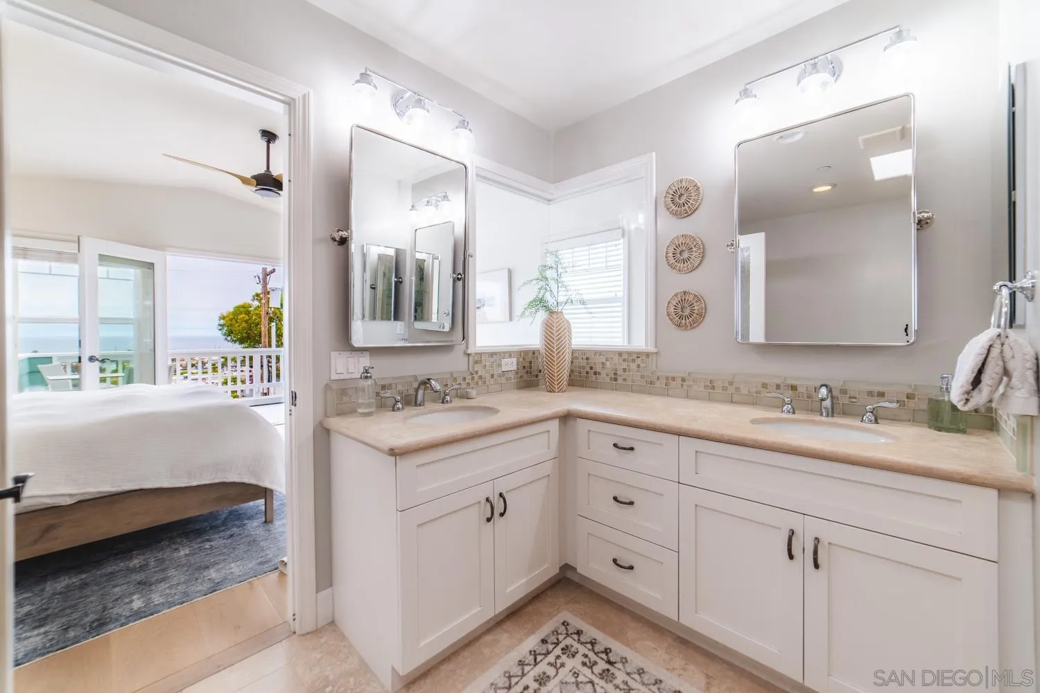 742 Cornish Drive Encinitas, CA 92024 - Photo 13 of 30 a bathroom with a sink and a mirror