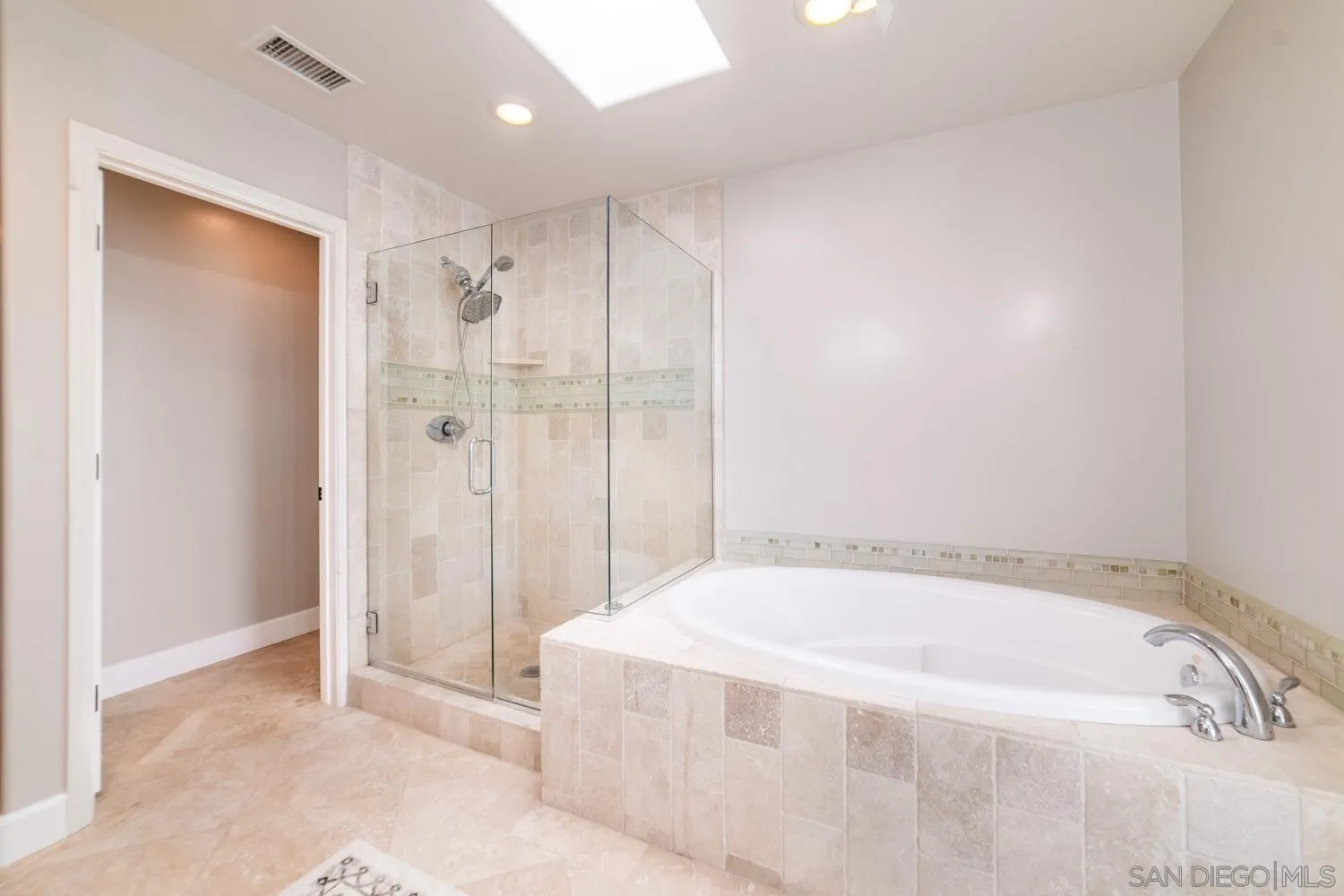742 Cornish Drive Encinitas, CA 92024 - Photo 14 of 30 a spacious bathroom with a bathtub and a shower