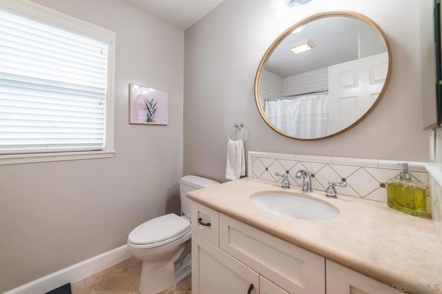 742 Cornish Drive Encinitas, CA 92024 - Photo 18 of 30 a bathroom with a granite countertop sink mirror and toilet