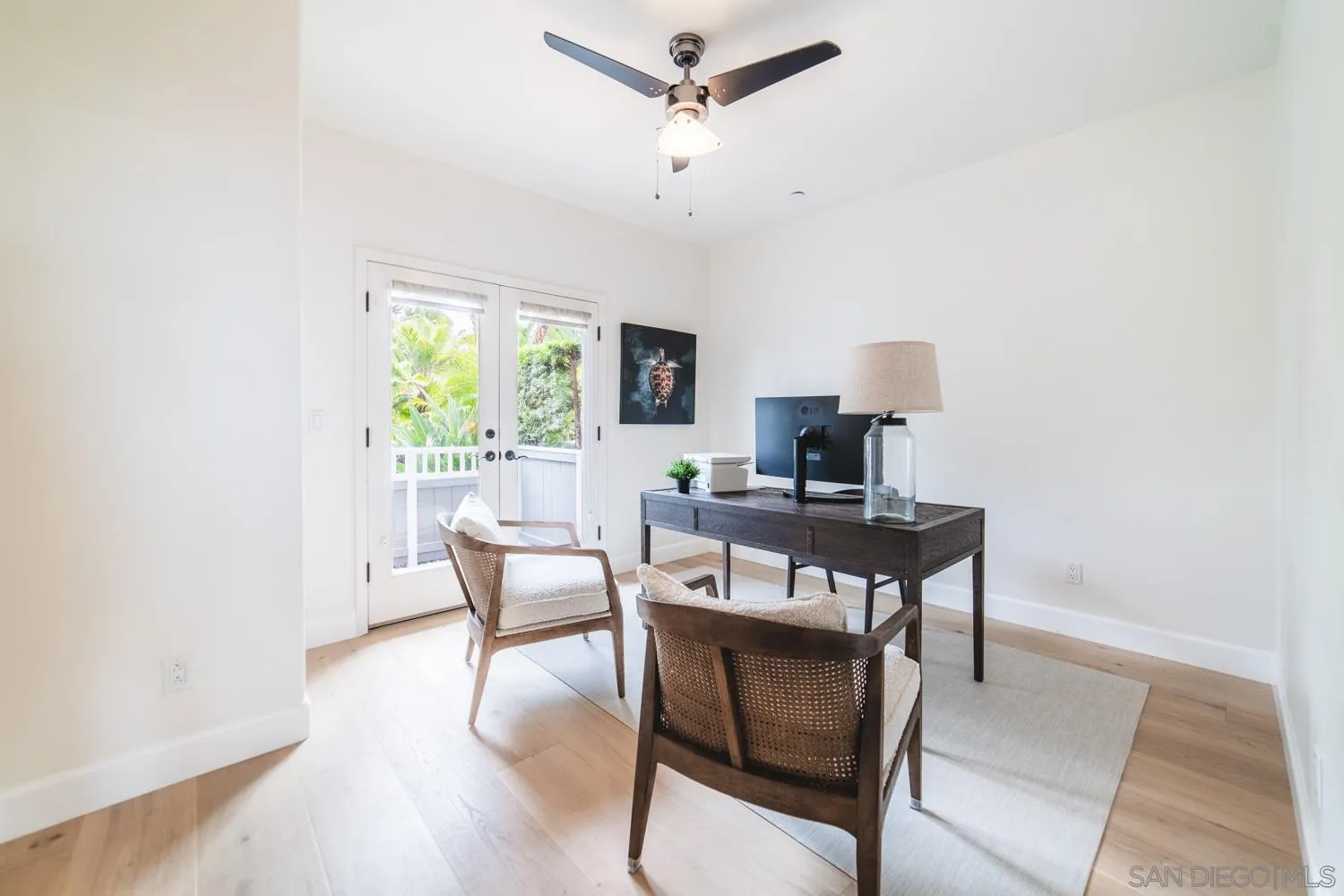 742 Cornish Drive Encinitas, CA 92024 - Photo 20 of 30 a view of a workspace with furniture and a window
