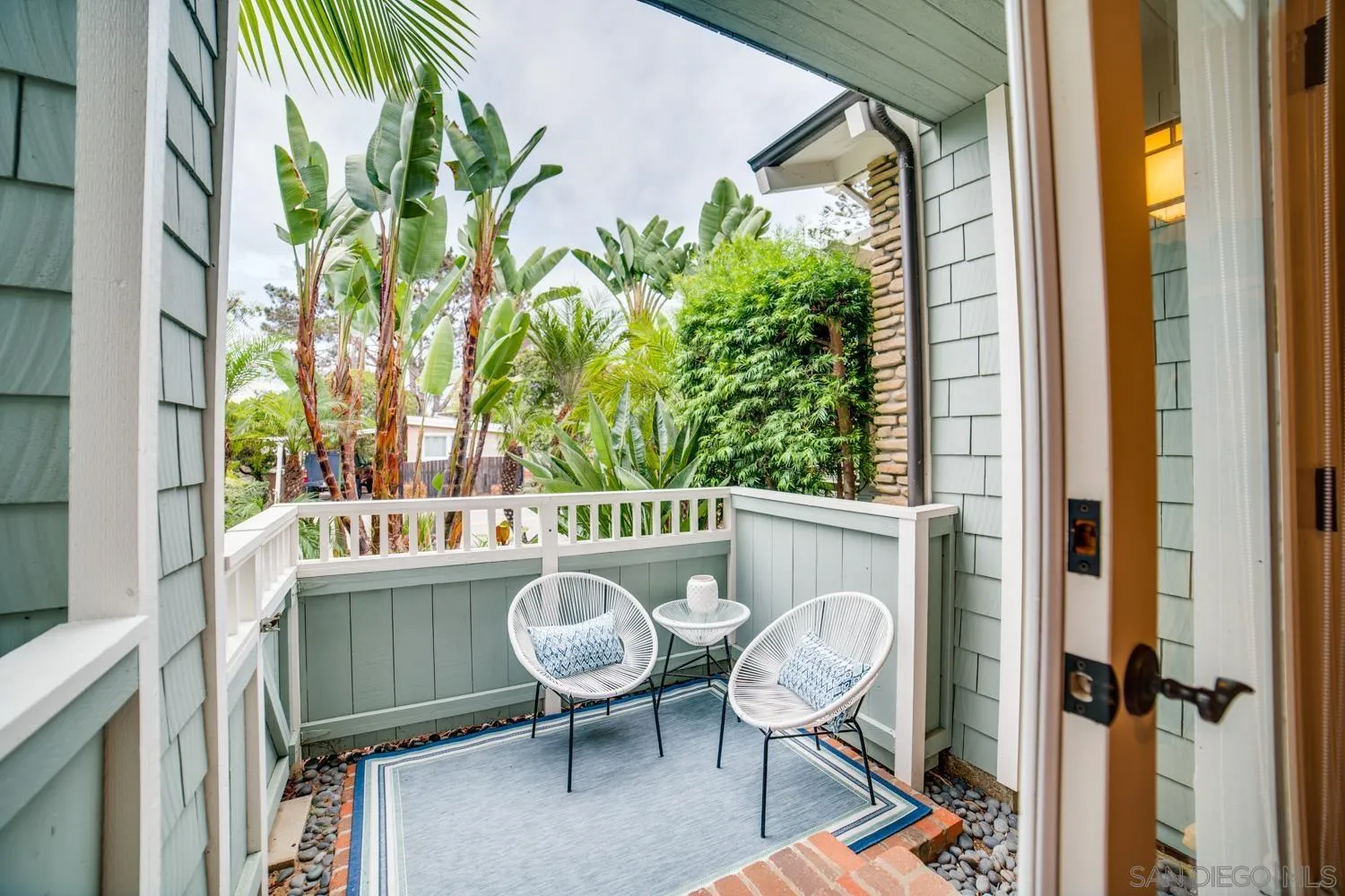 742 Cornish Drive Encinitas, CA 92024 - Photo 21 of 30 a view of balcony with a potted plant and outdoor seating