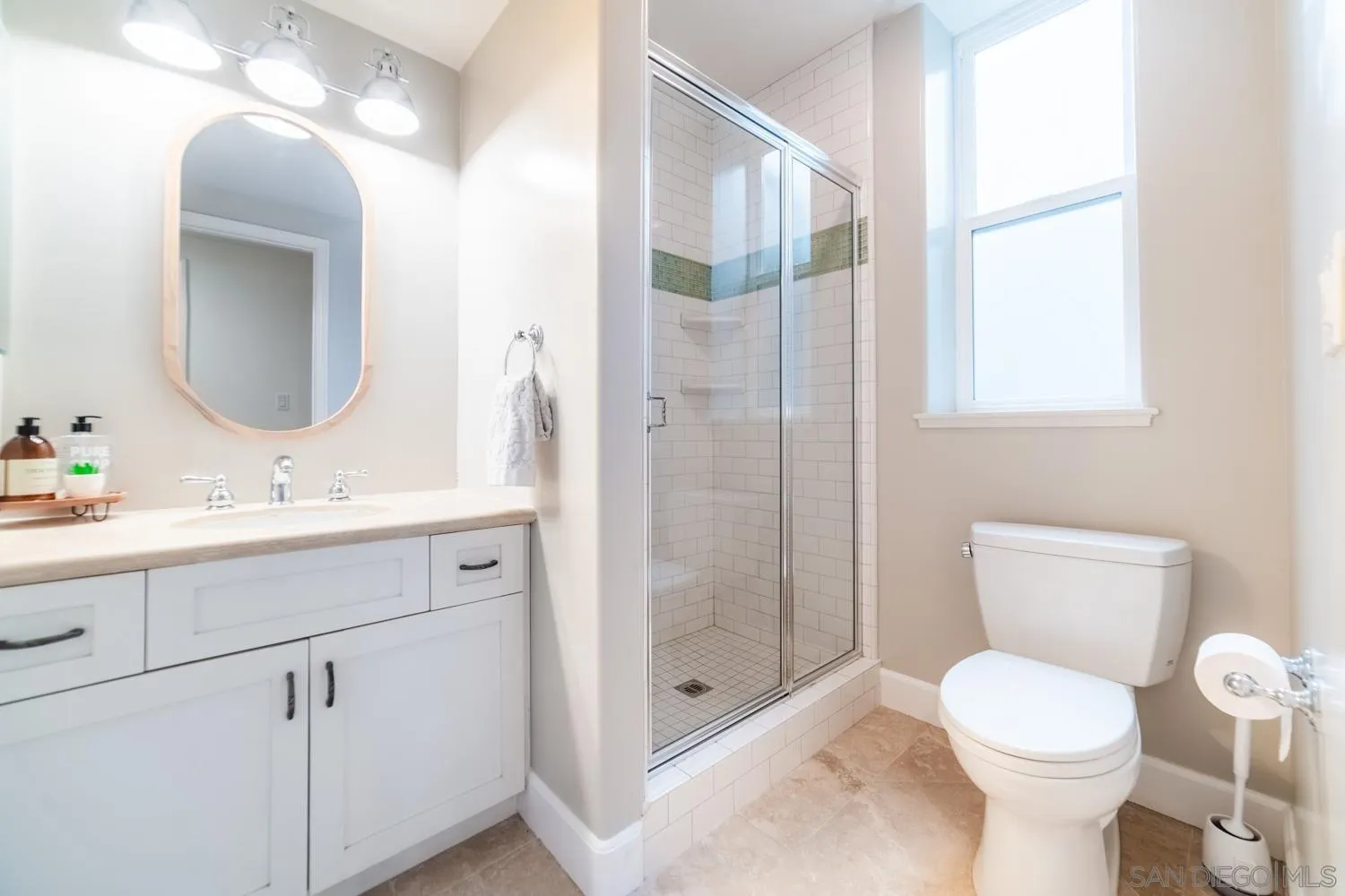 742 Cornish Drive Encinitas, CA 92024 - Photo 25 of 30 a bathroom with a toilet sink and shower