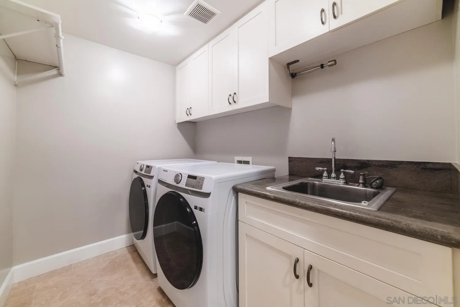 742 Cornish Drive Encinitas, CA 92024 - Photo 26 of 30 a utility room with dryer and washer