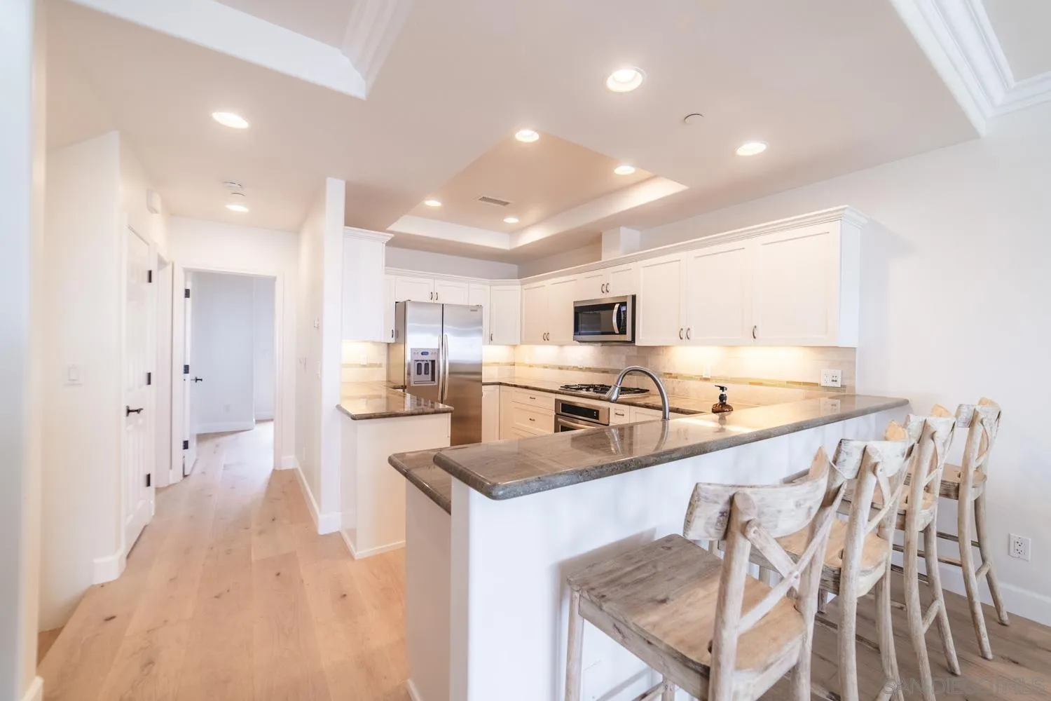 742 Cornish Drive Encinitas, CA 92024 - Photo 9 of 30 a large kitchen with granite countertop lots of counter space and stainless steel appliances