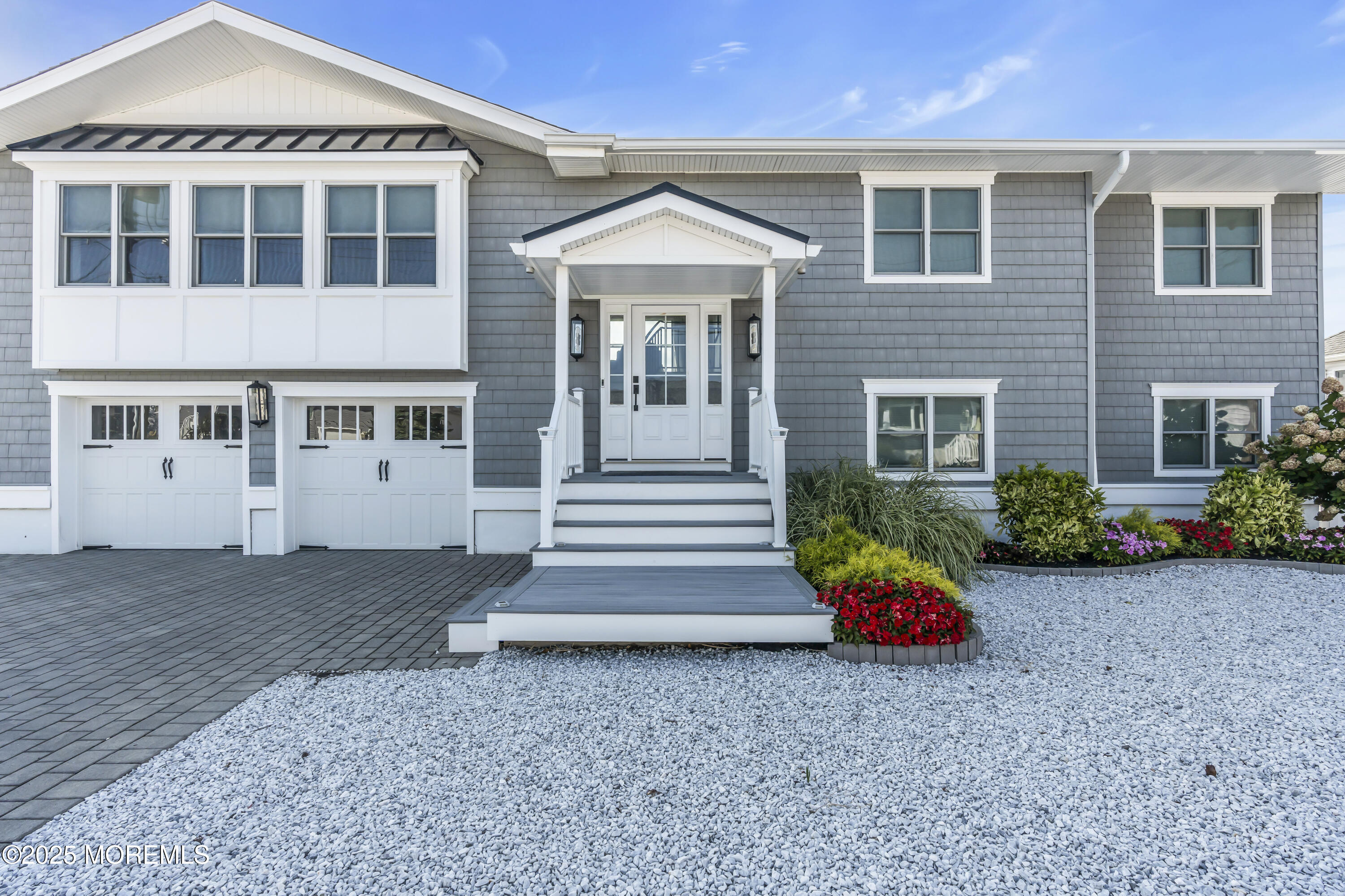 8 Channel Road Toms River, NJ 08753 - Photo 2 of 60 front view of a house with a garden