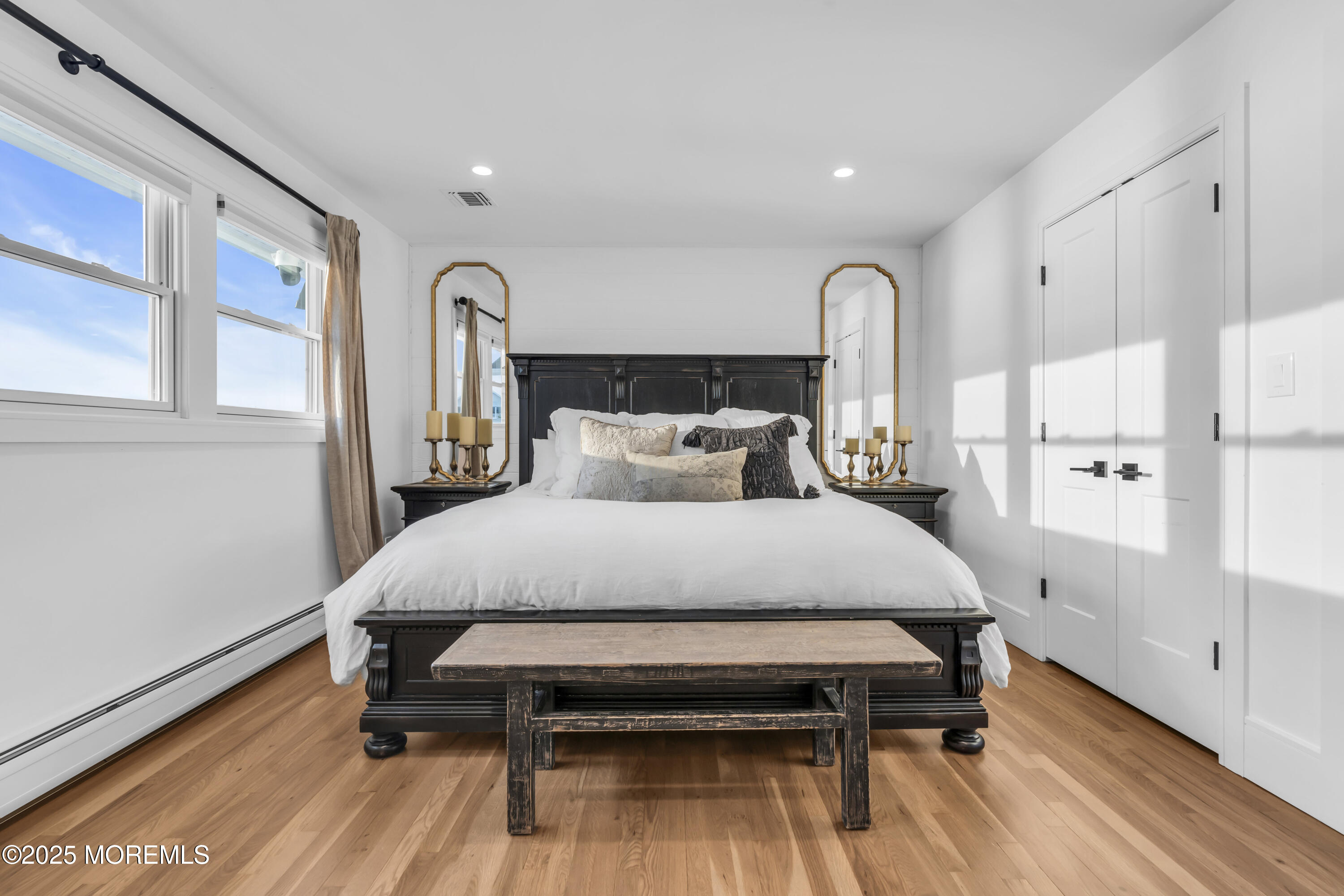 8 Channel Road Toms River, NJ 08753 - Photo 21 of 60 a bedroom with a bed and wooden floor