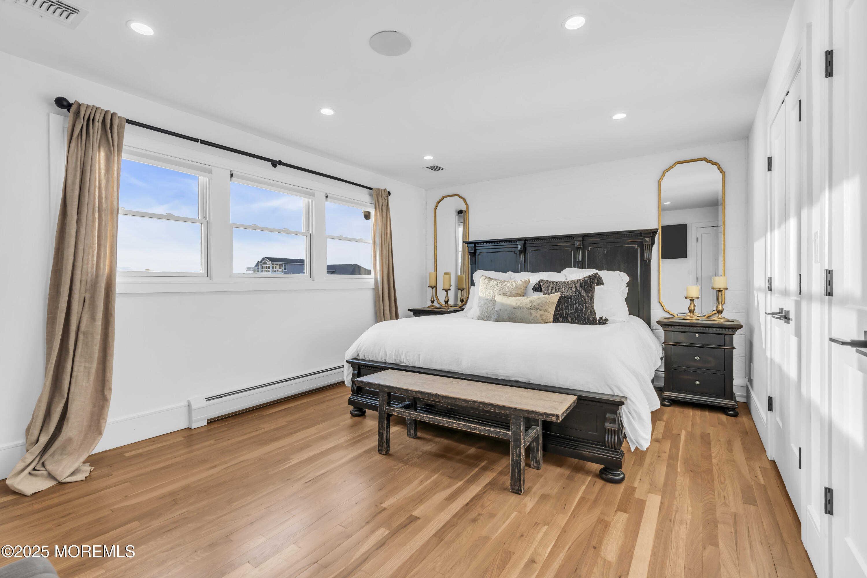 8 Channel Road Toms River, NJ 08753 - Photo 22 of 60 a bedroom with a bed and wooden floor