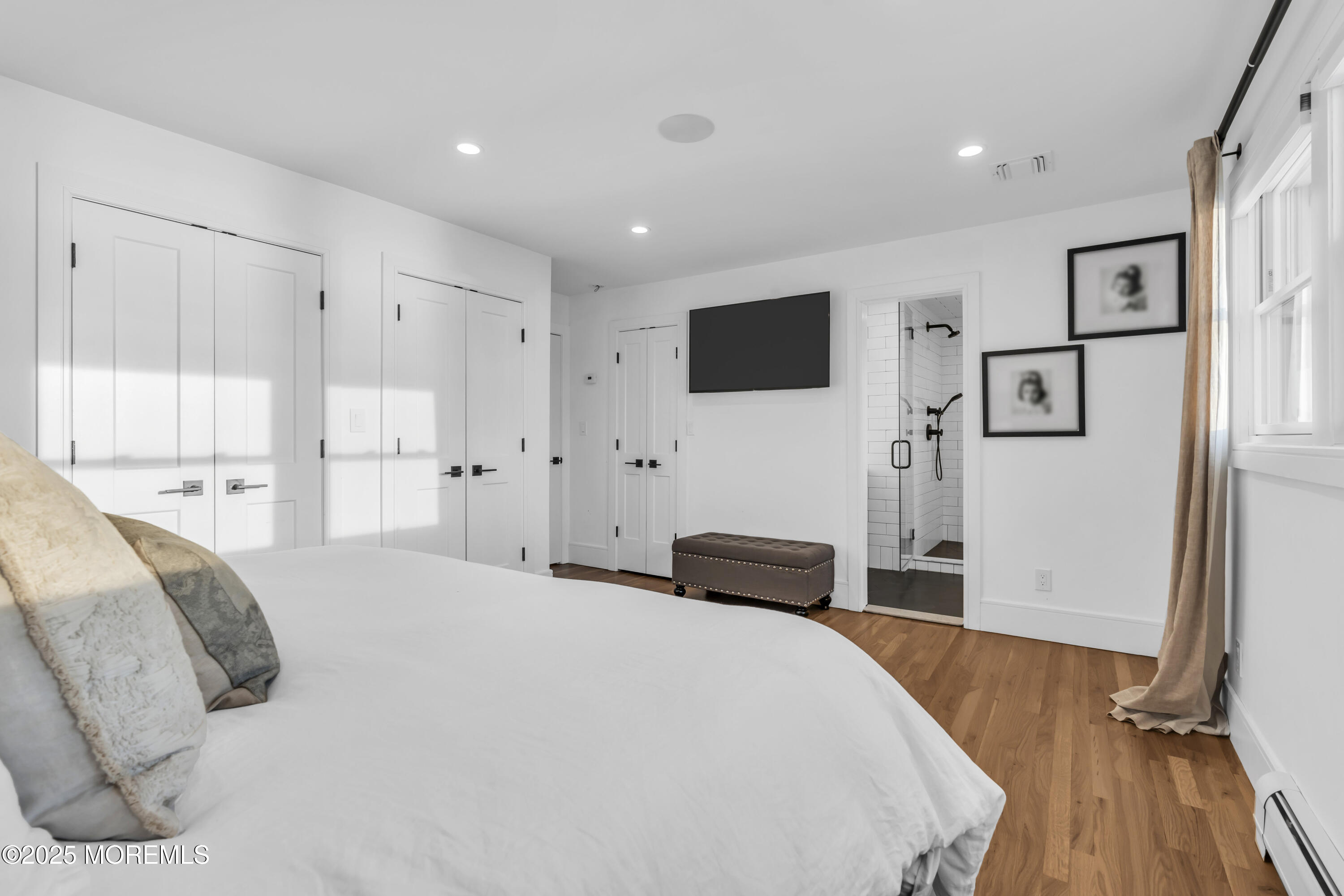 8 Channel Road Toms River, NJ 08753 - Photo 23 of 60 a bedroom with a bed and a flat screen tv