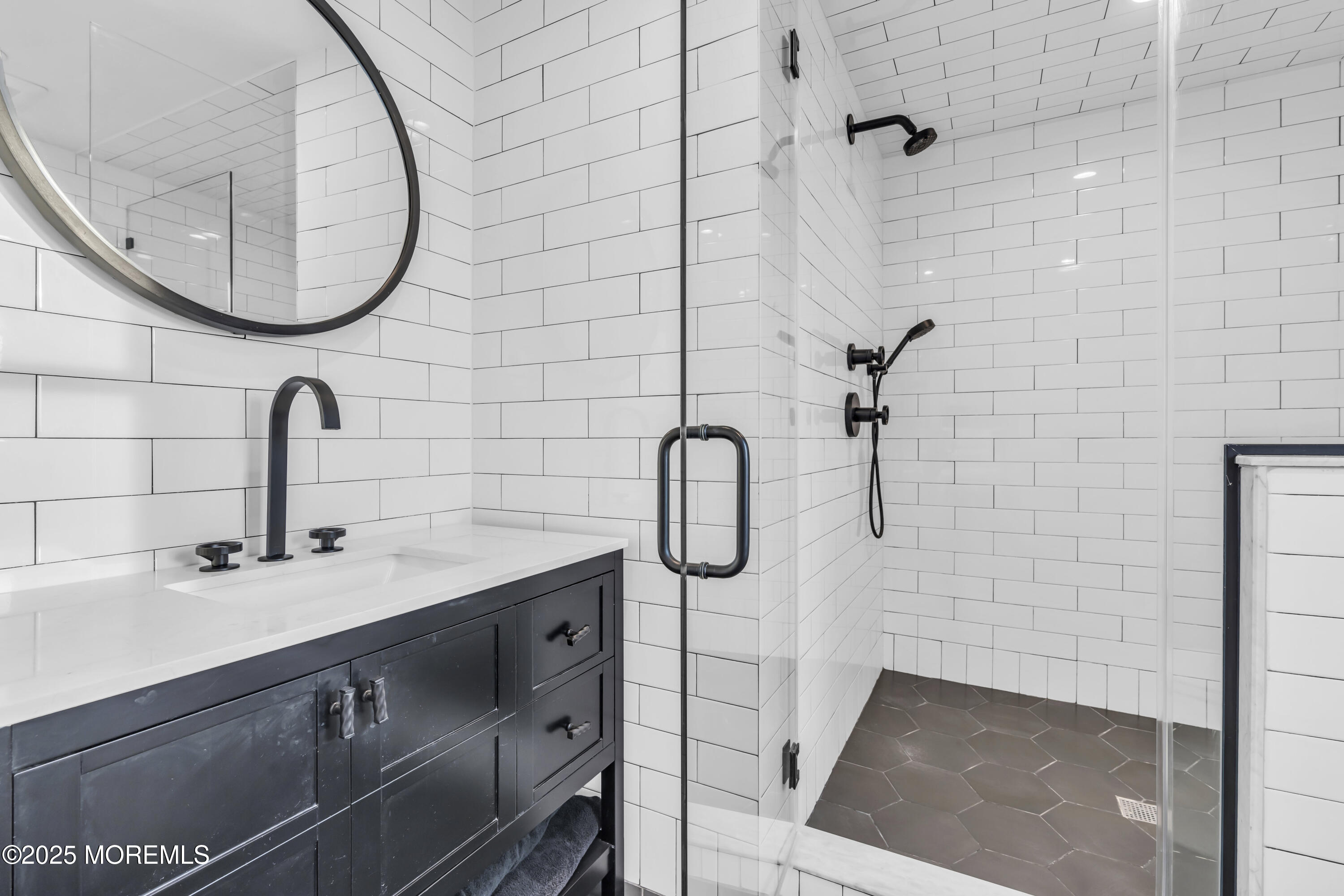 8 Channel Road Toms River, NJ 08753 - Photo 25 of 60 a bathroom with a sink and a mirror
