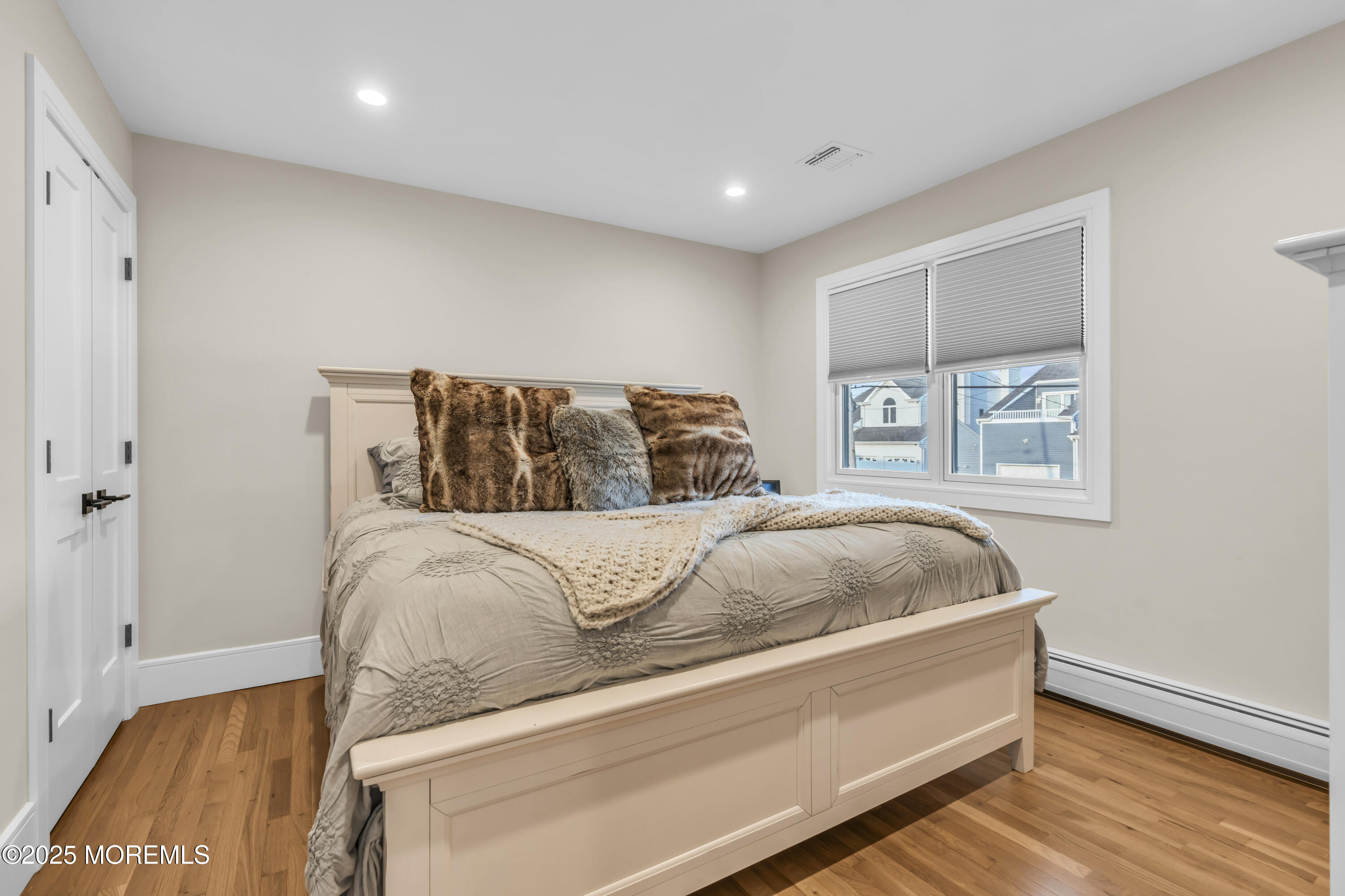 8 Channel Road Toms River, NJ 08753 - Photo 27 of 60 a bedroom with a bed and window