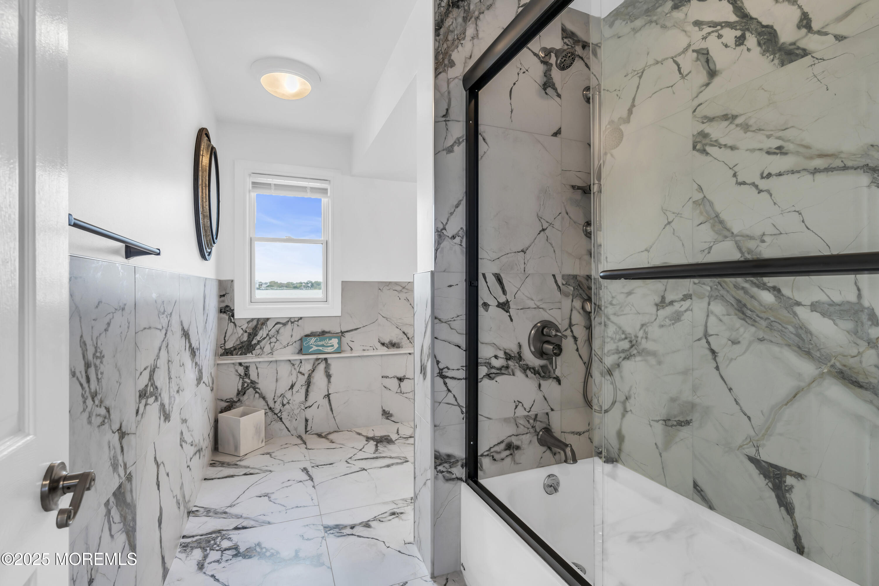 8 Channel Road Toms River, NJ 08753 - Photo 32 of 60 a bathroom with a bathtub and shower