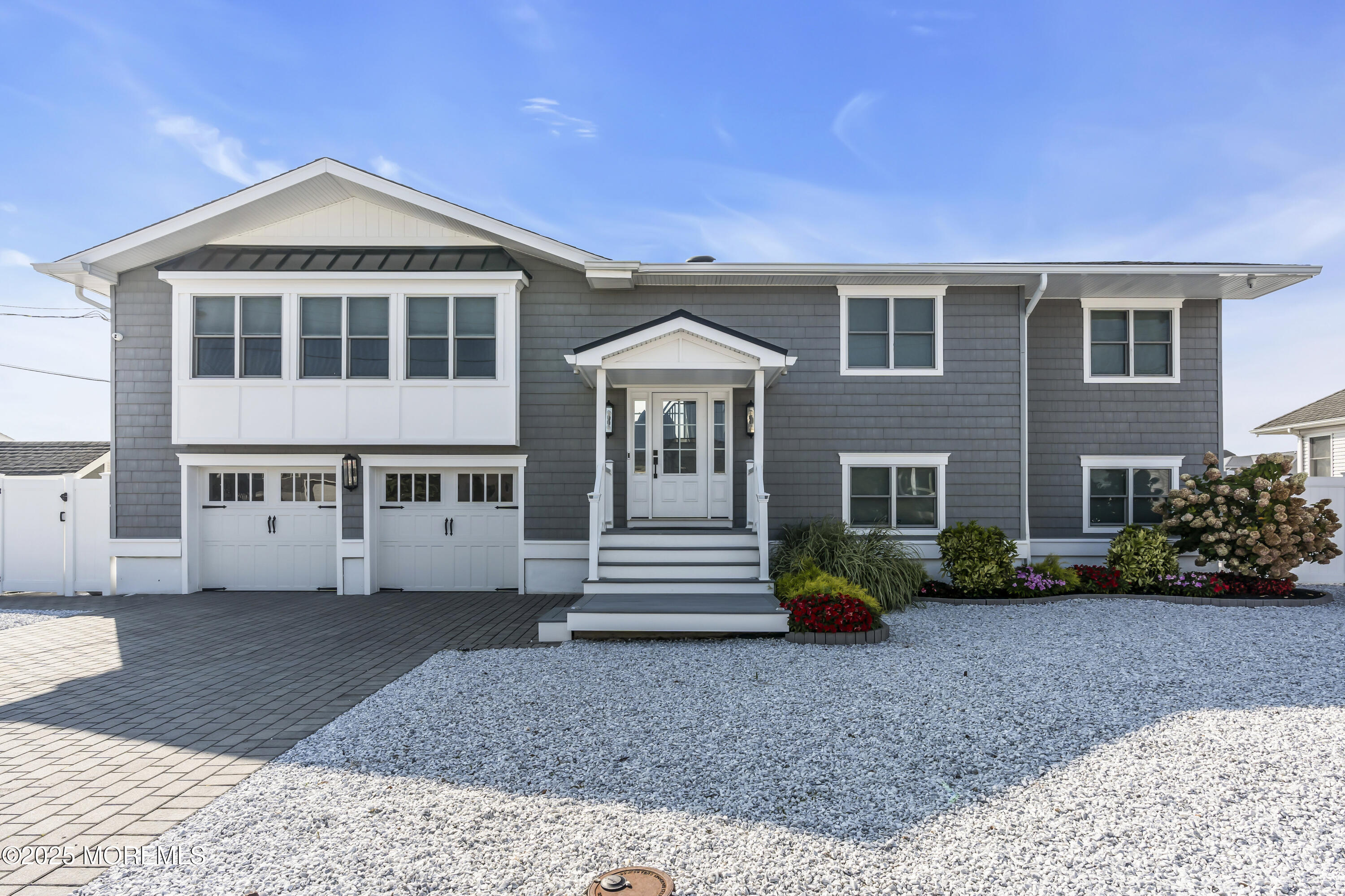 8 Channel Road Toms River, NJ 08753 - Photo 4 of 60 a front view of a house with a yard