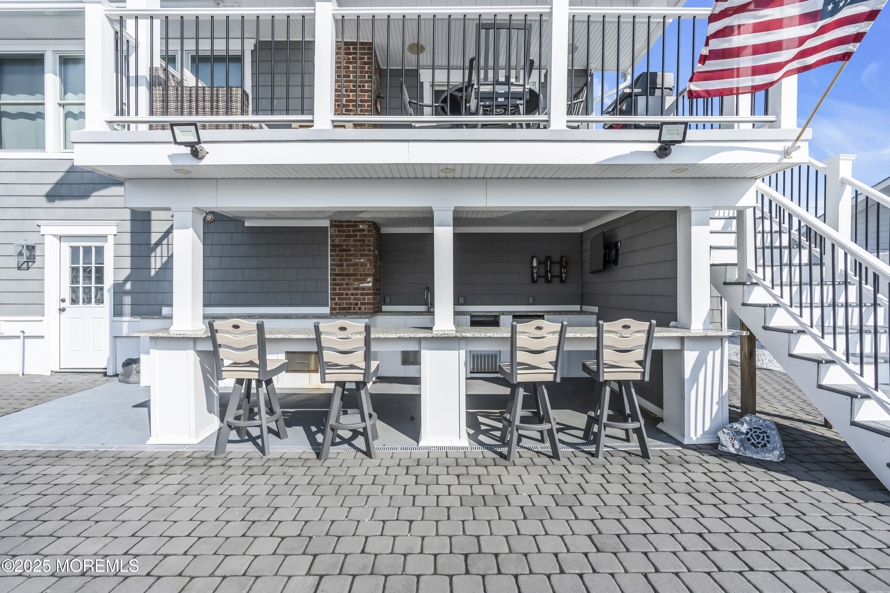 8 Channel Road Toms River, NJ 08753 - Photo 40 of 60 a group of chairs sitting in front of building