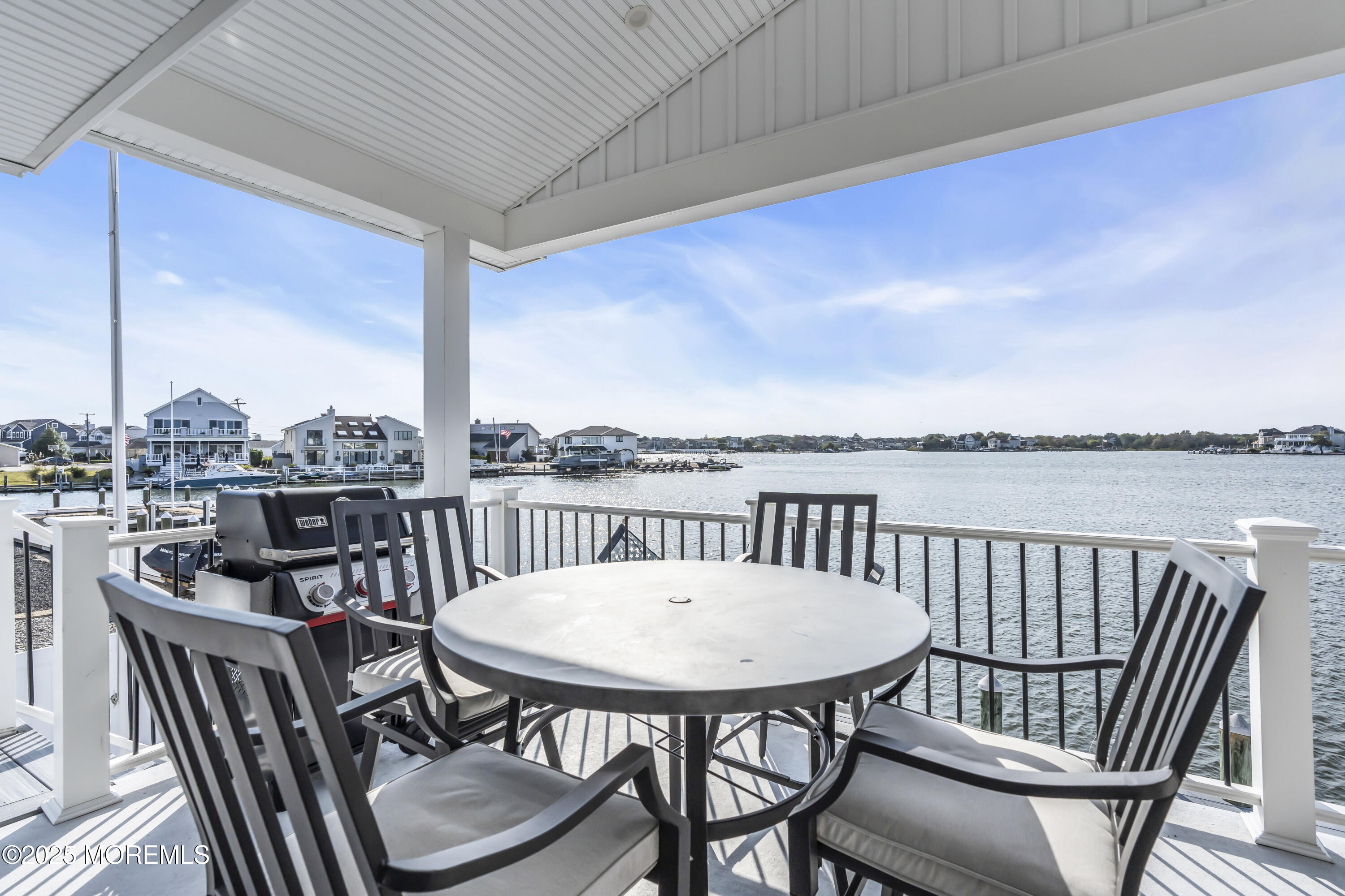 8 Channel Road Toms River, NJ 08753 - Photo 49 of 60 a view of a balcony chairs and a table and chairs