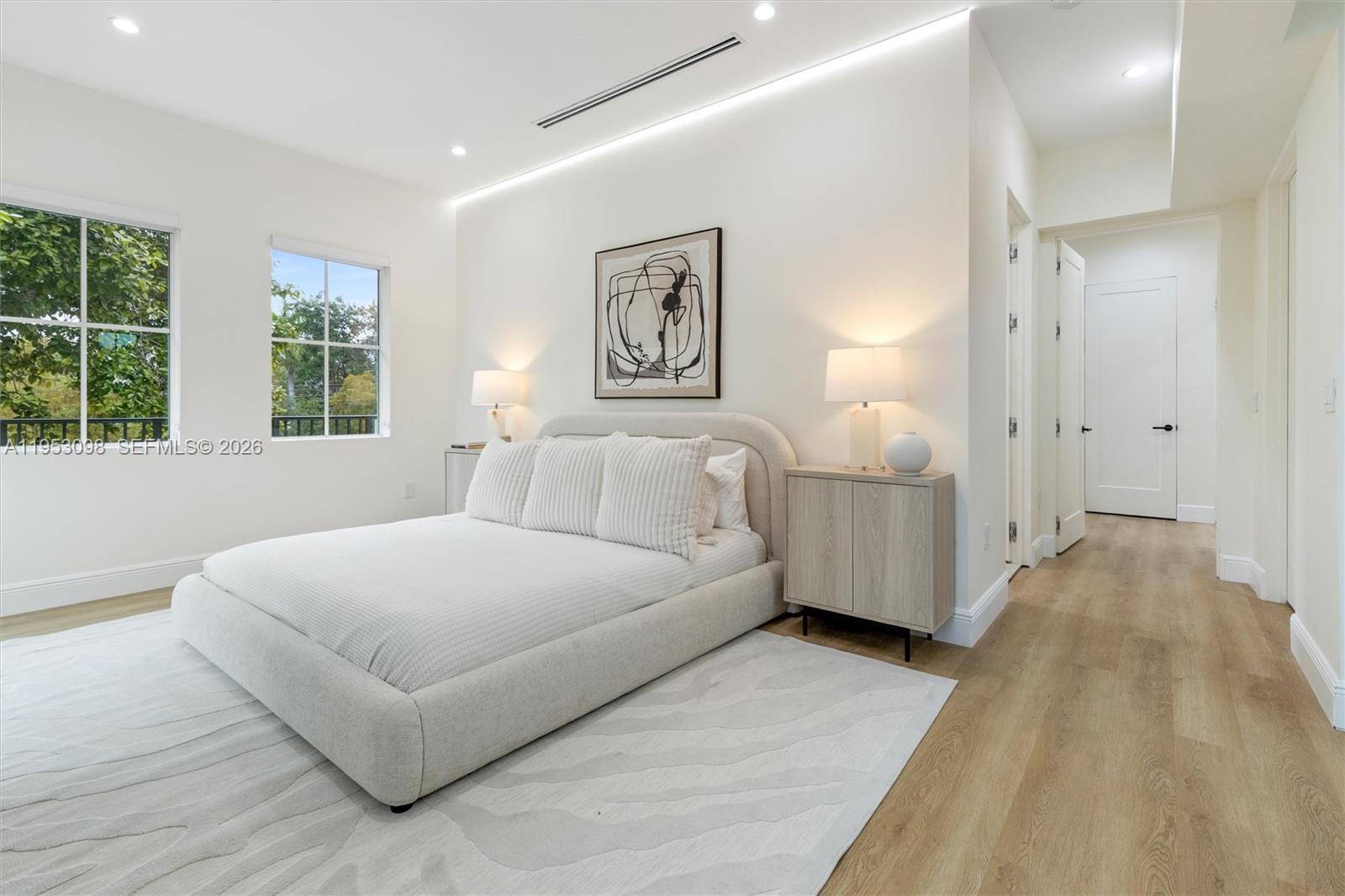 3495 Southwest 3rd Avenue Miami, FL 33145 - Photo 18 of 35 a spacious bedroom with a bed and window
