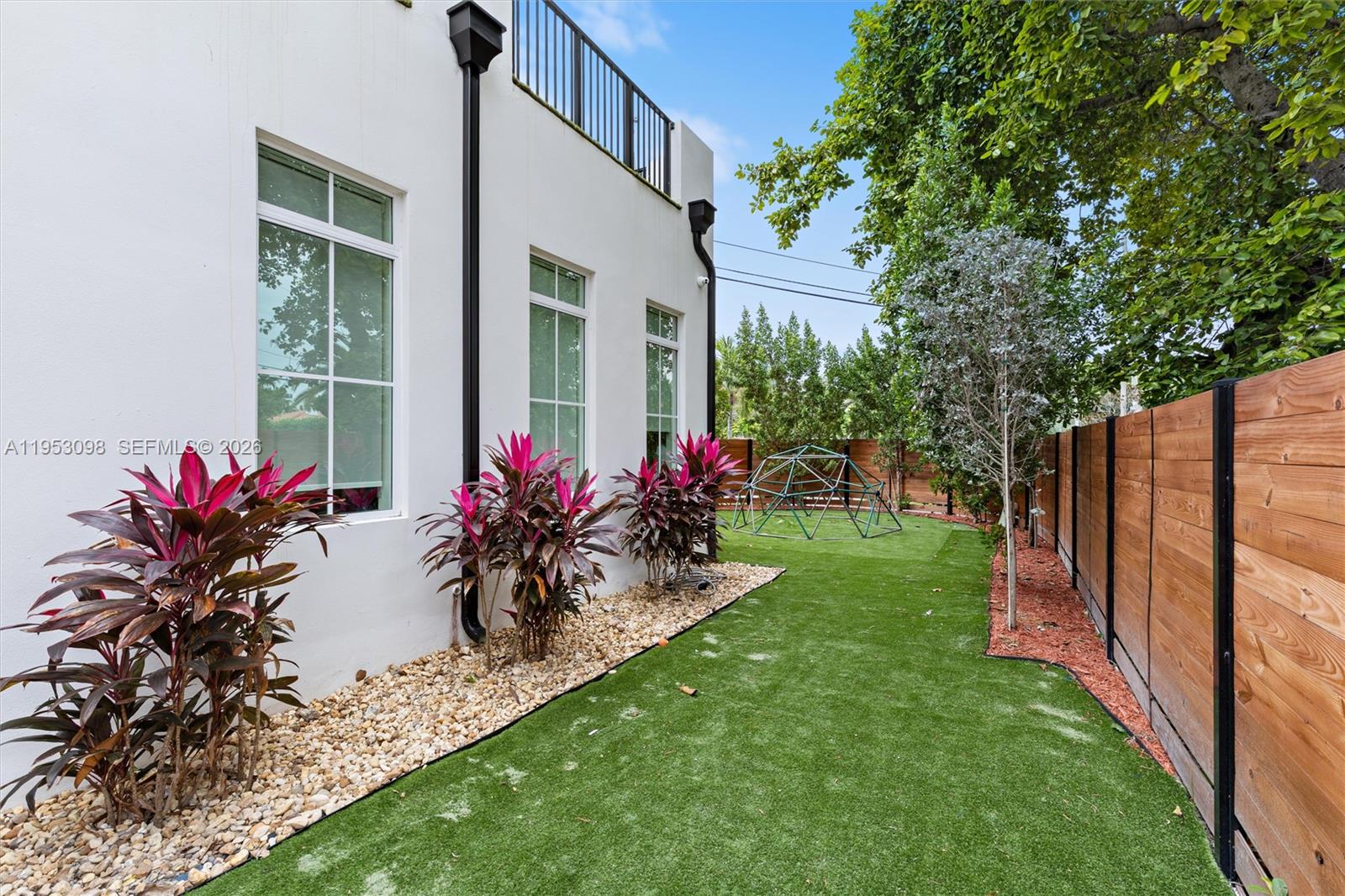 3495 Southwest 3rd Avenue Miami, FL 33145 - Photo 25 of 35 a view of a house with a backyard