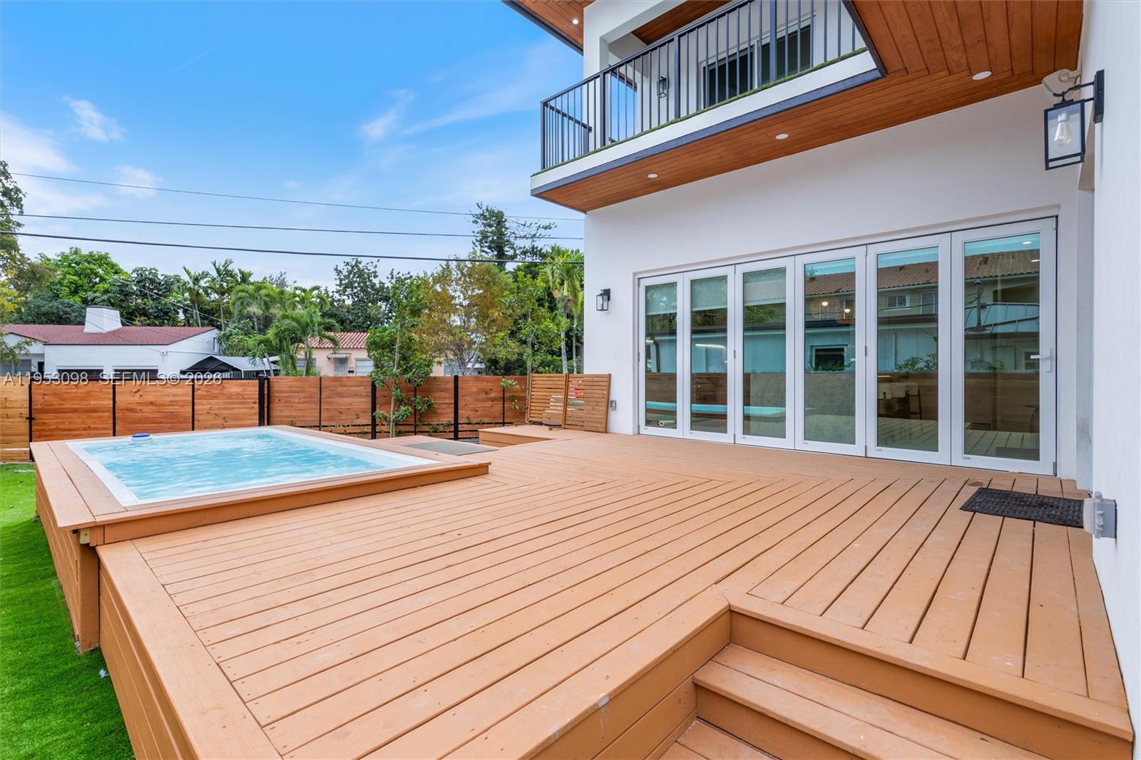 3495 Southwest 3rd Avenue Miami, FL 33145 - Photo 29 of 35 a view of a house with pool and wooden floor