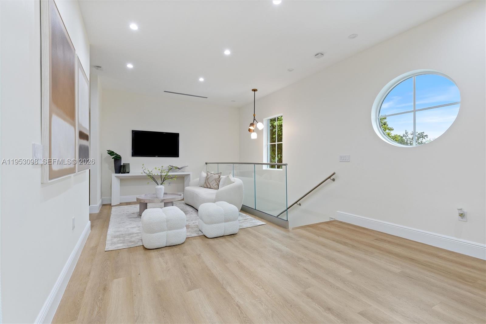 3495 Southwest 3rd Avenue Miami, FL 33145 - Photo 10 of 25 a bed room with furniture and a flat screen tv